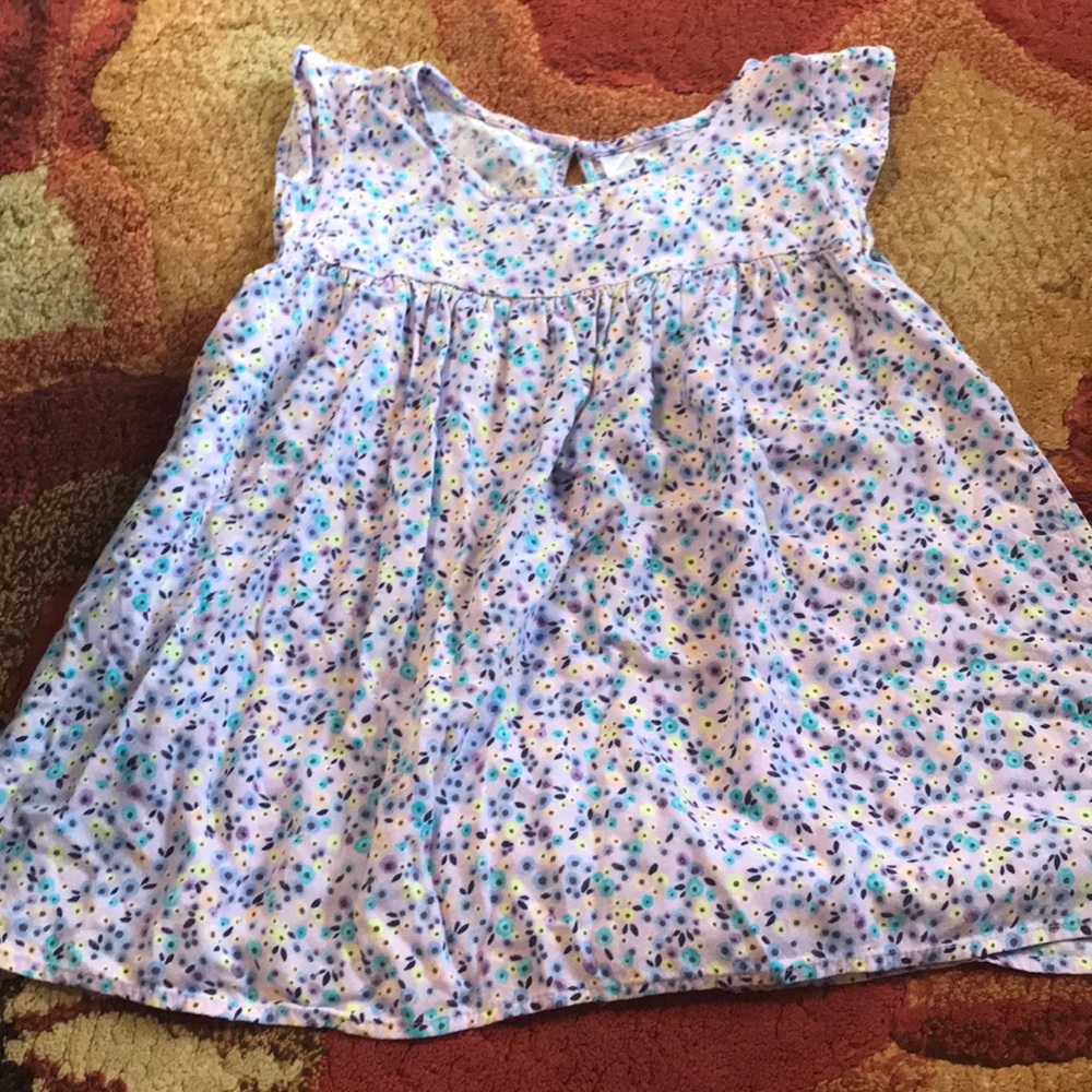 Purple blouse with floral design